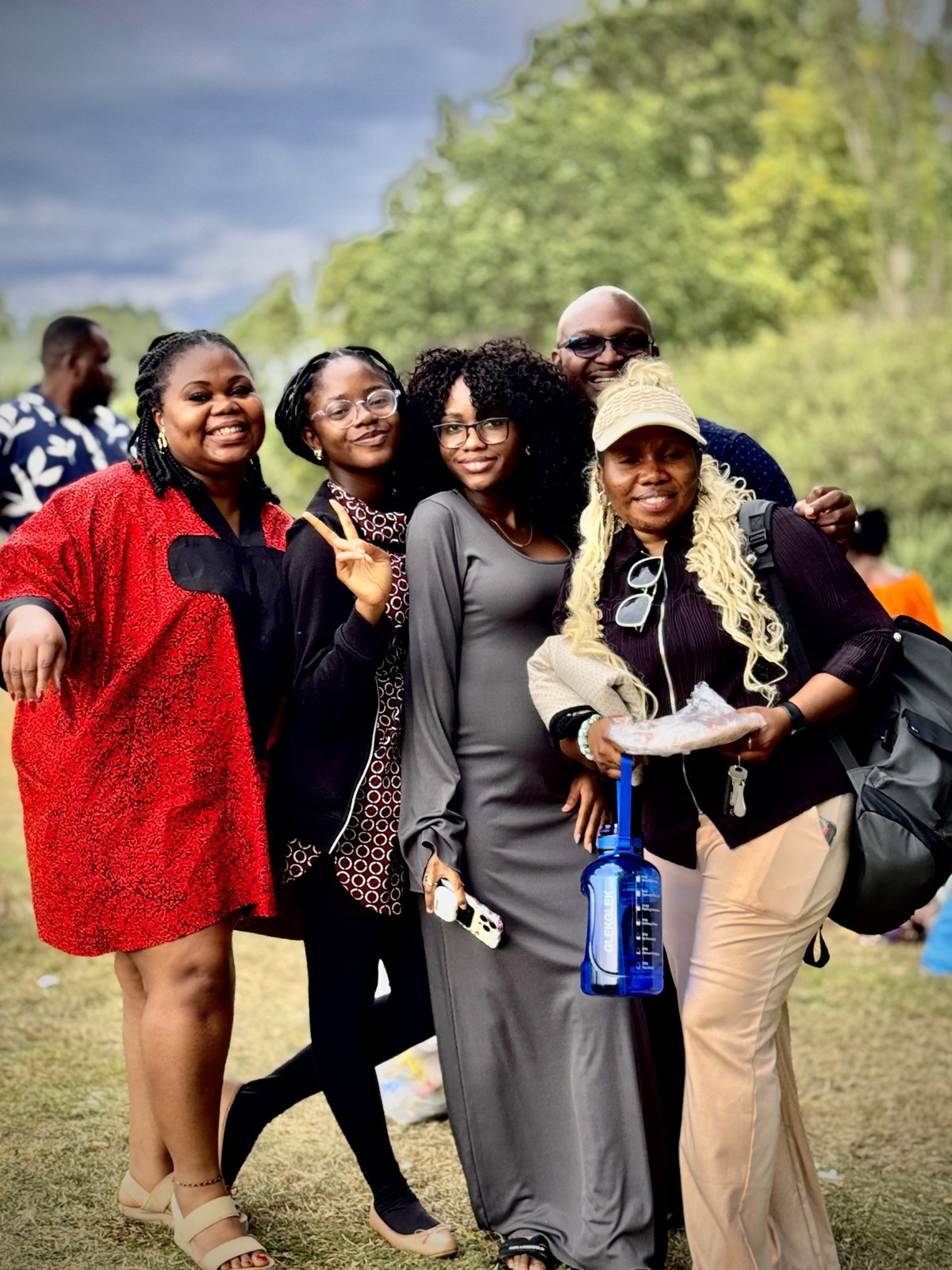 A group of members at a park Sunday